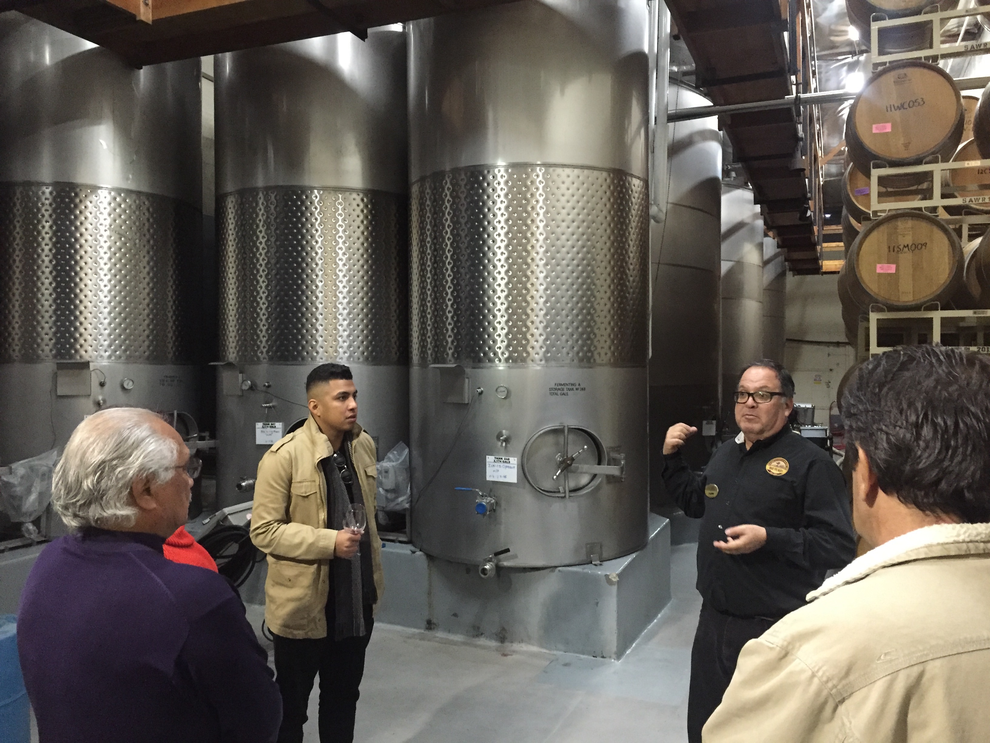 Tour guide Tom Sanchez explains how wine is made