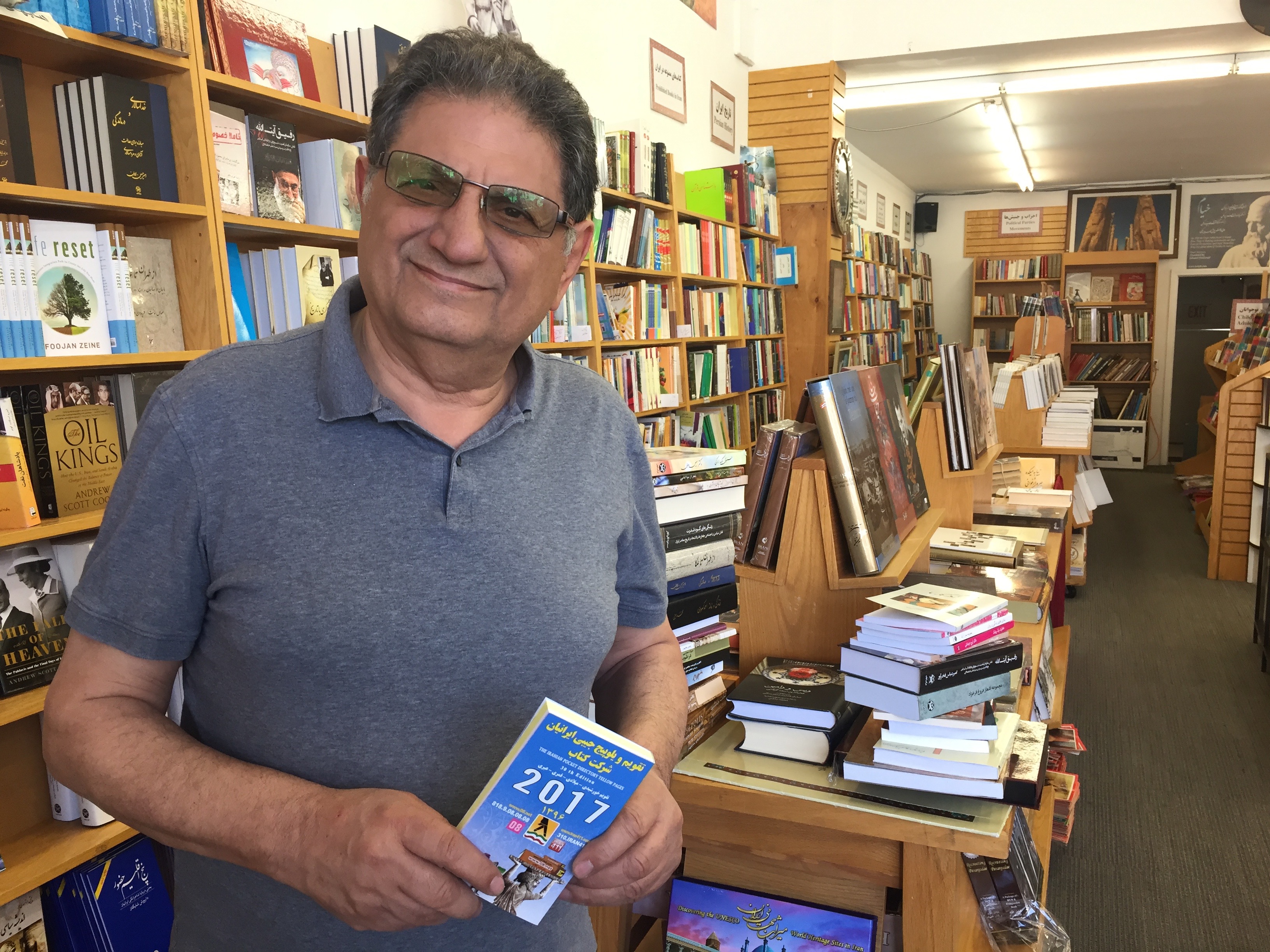 Bijan Khalili with his Iranian yellowpages inside Ketab Corporation