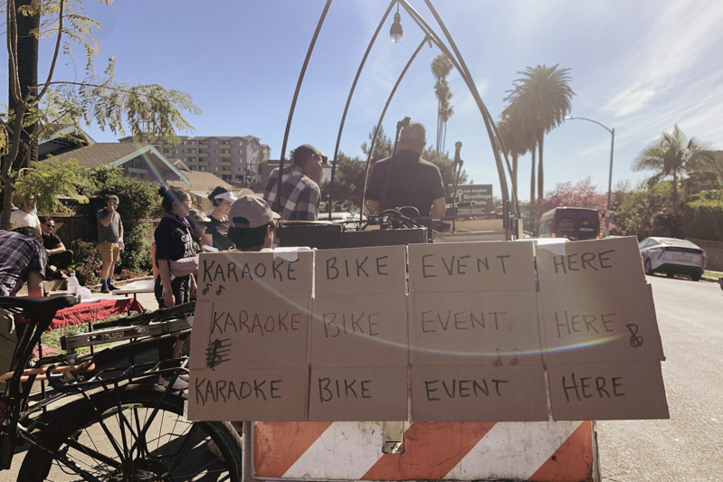 A karoke mic on a bicycle.