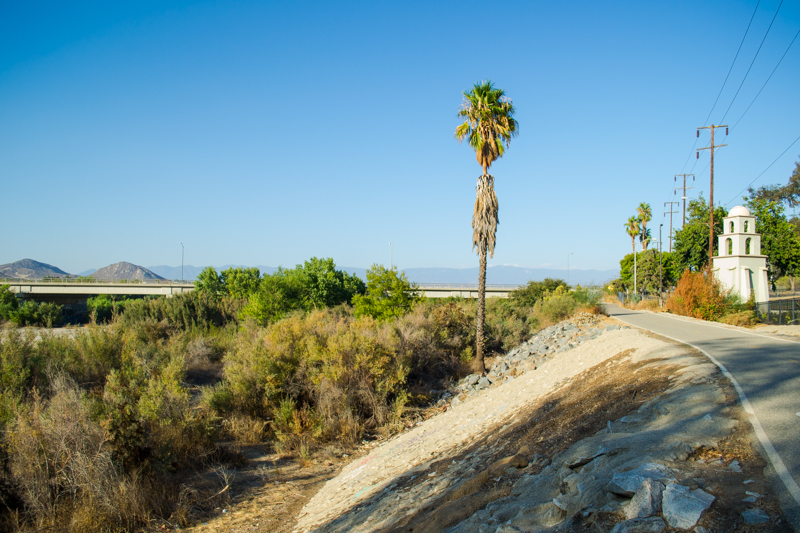 A portion of the Santa Ana River Trail near a freeway.