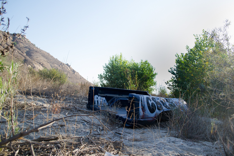 An abandoned truck bed in the Santa Ana Riverbed.